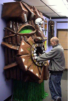 A visitor using the TattooNOW touchscreen kiosk, late 1990s